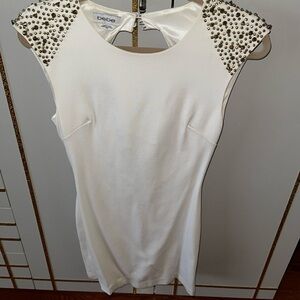 Bebe backless white mini dress gold studs